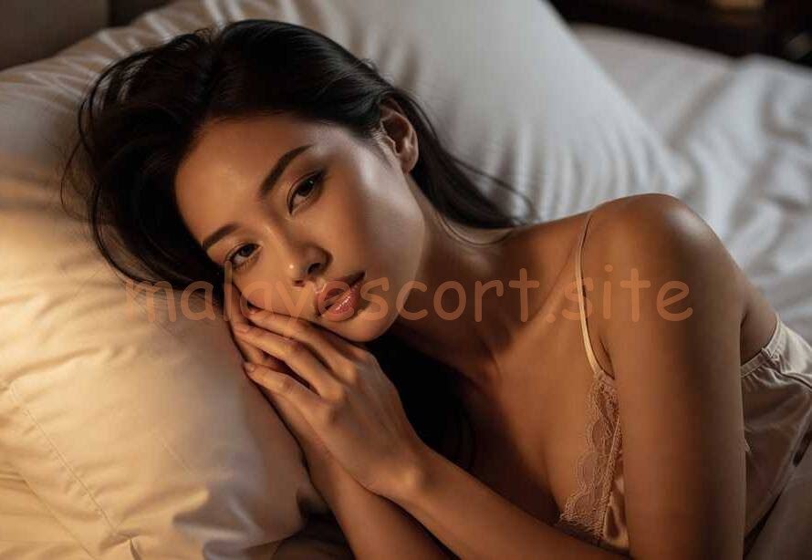 Beautiful woman resting on a pillow in soft lighting