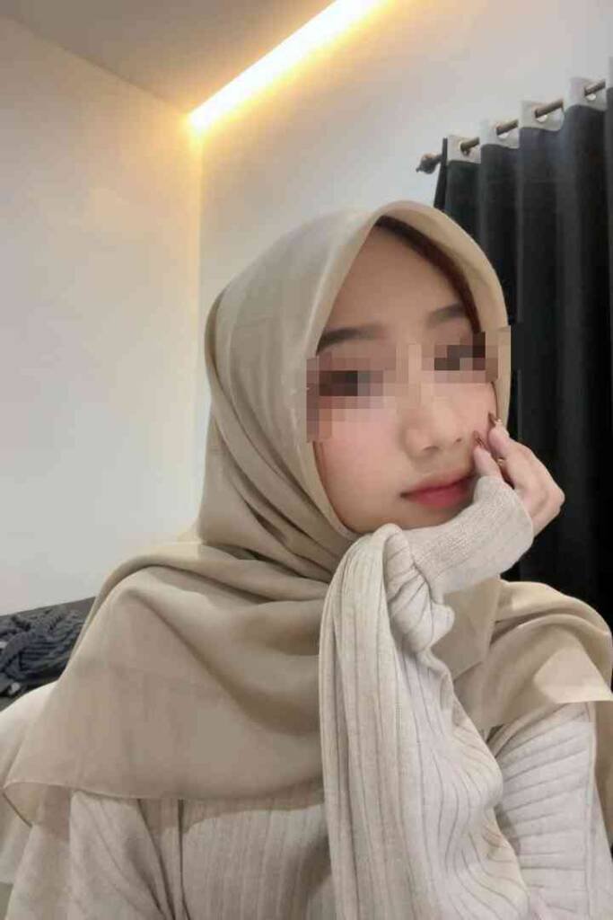Young Malay woman in hijab, KL escort