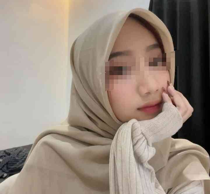 Young Malay woman in hijab, KL escort